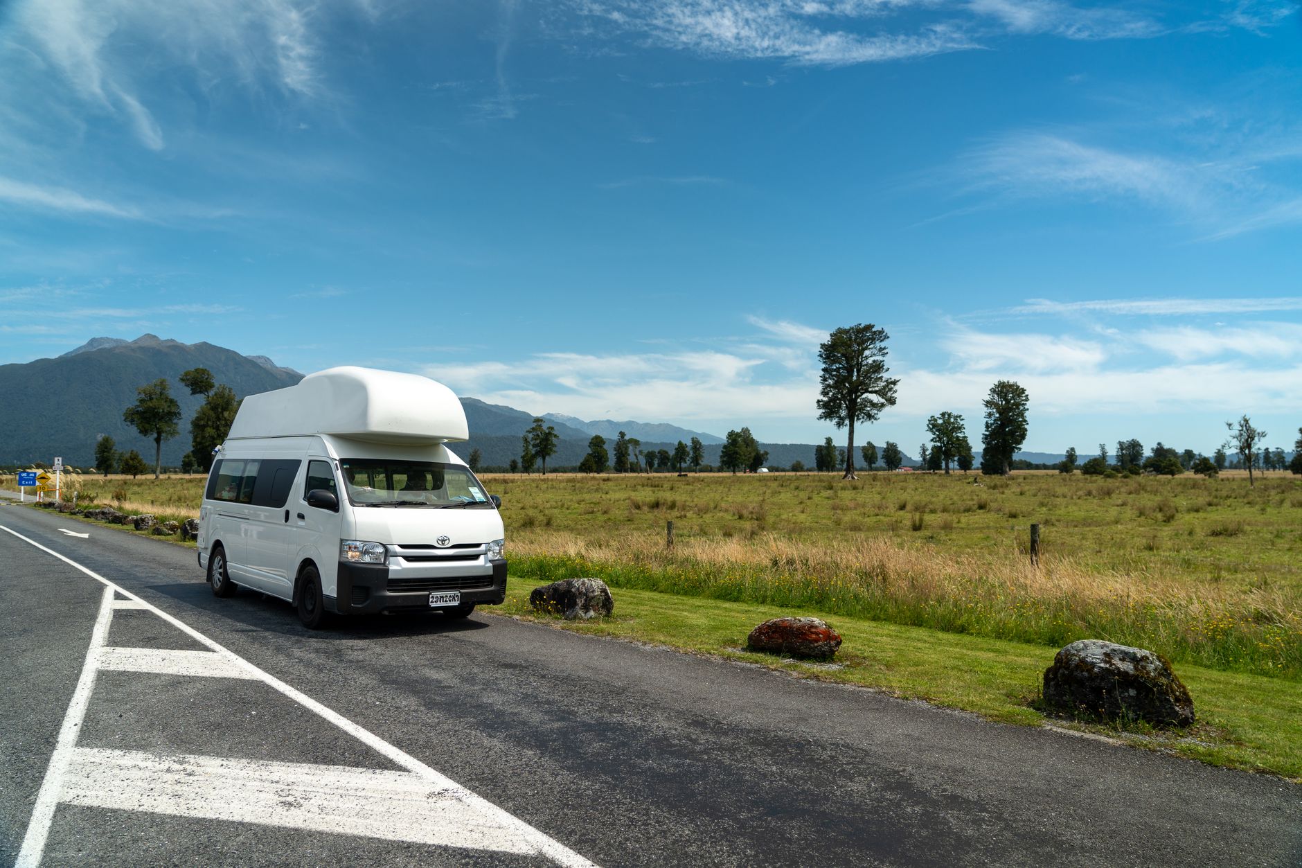 Modern campervan parked in valley