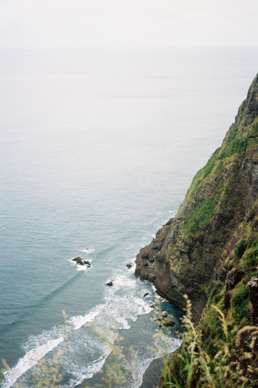 Lush volcanic coastal cliffs